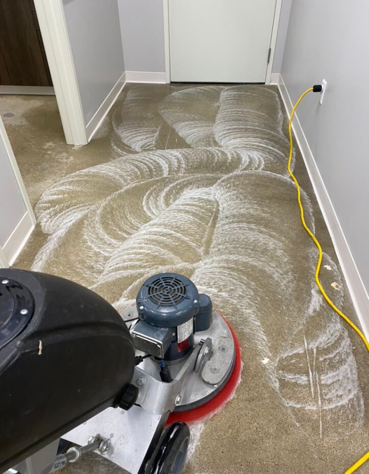 Wet grinding slurry during Timla hard-floor restoration