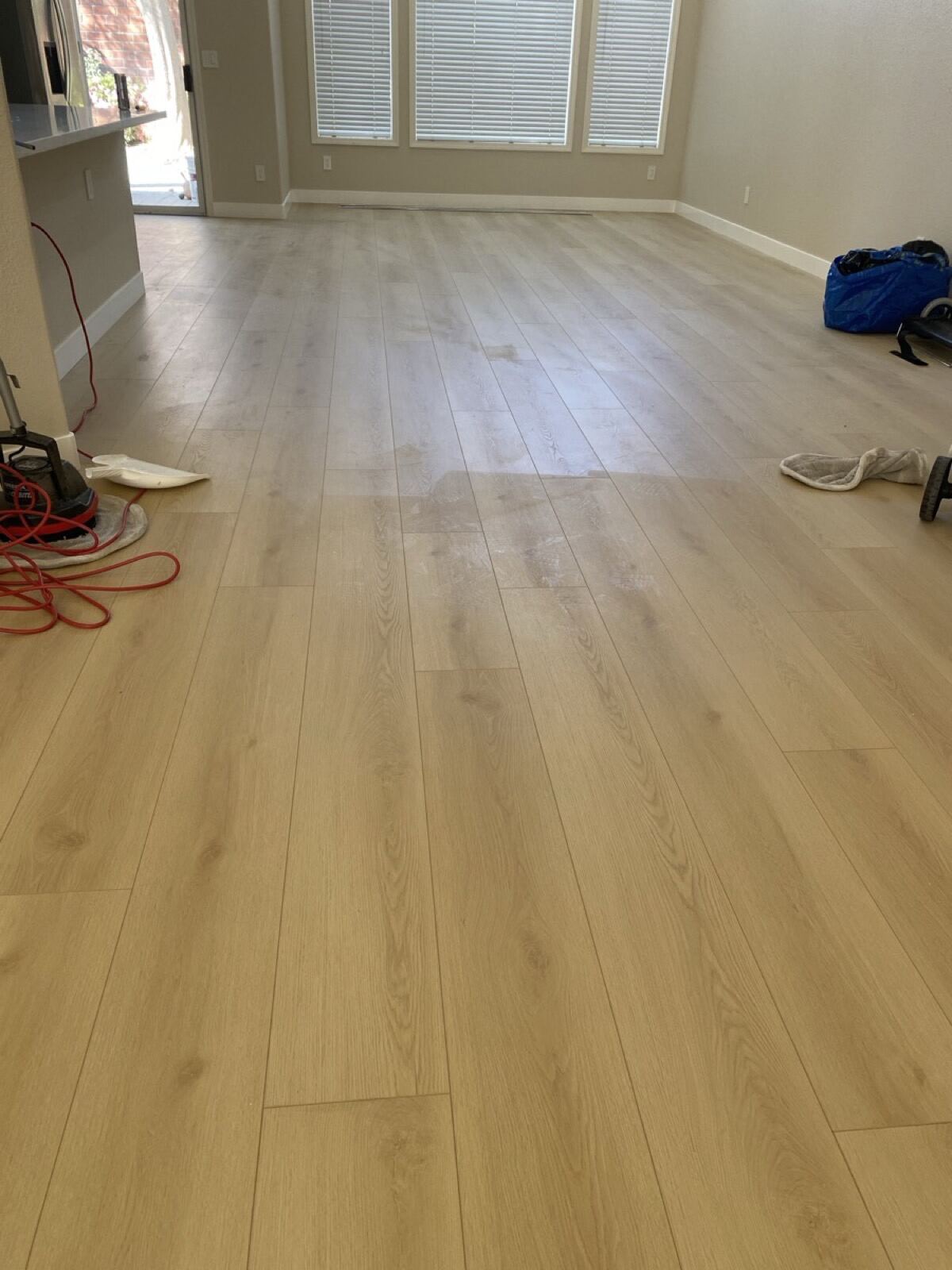 Large residential room with finished laminate and Timla buffer on site