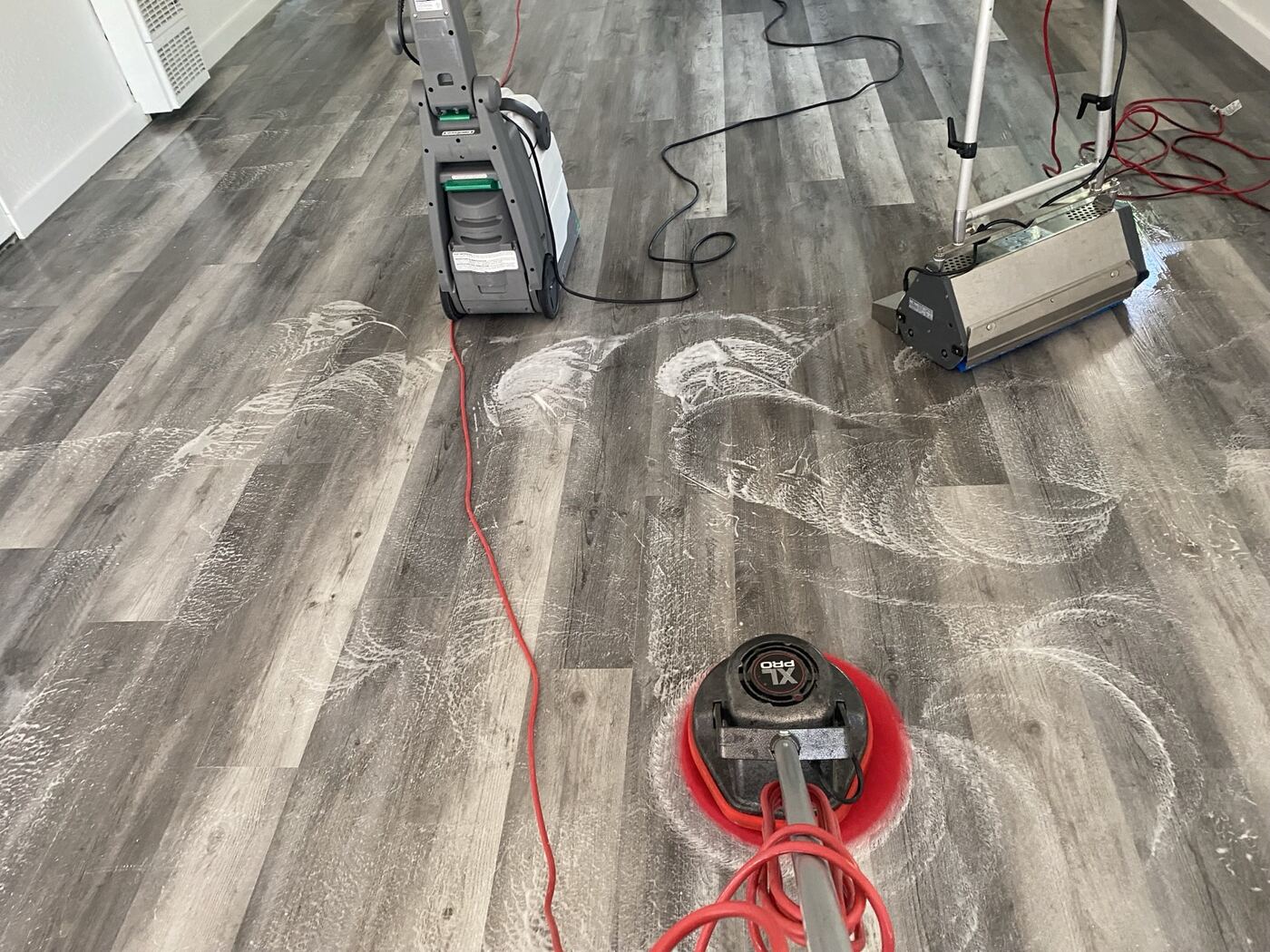 Multiple floor machines and foam on laminate during deep scrub