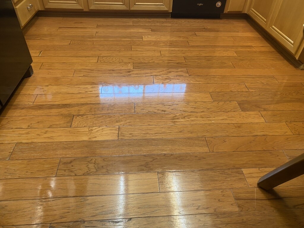 Residential kitchen hardwood after Timla wax removal and re-application